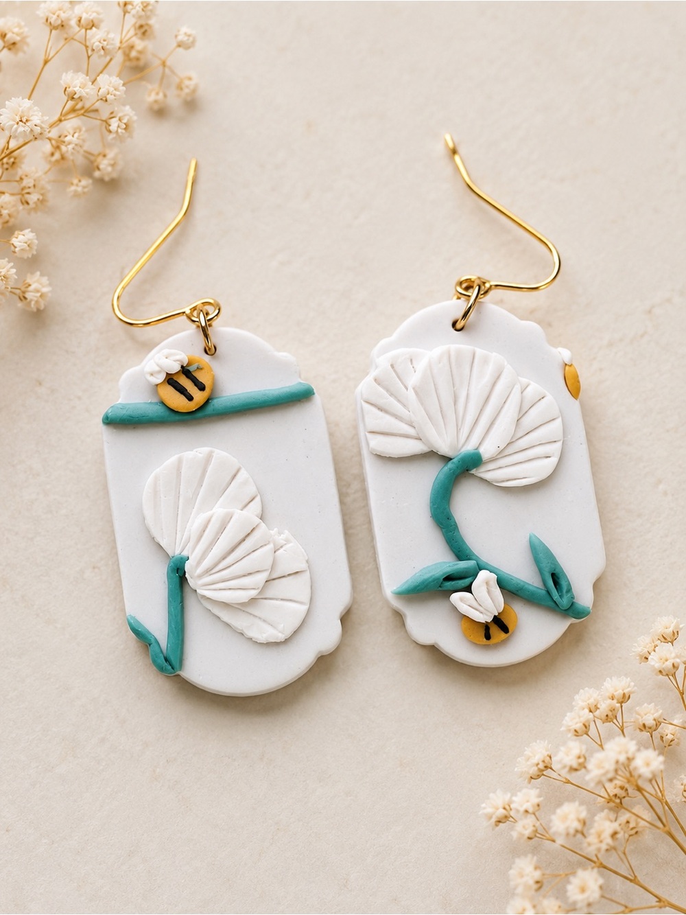 White Floral Polymer Clay Earrings with Teal Accents